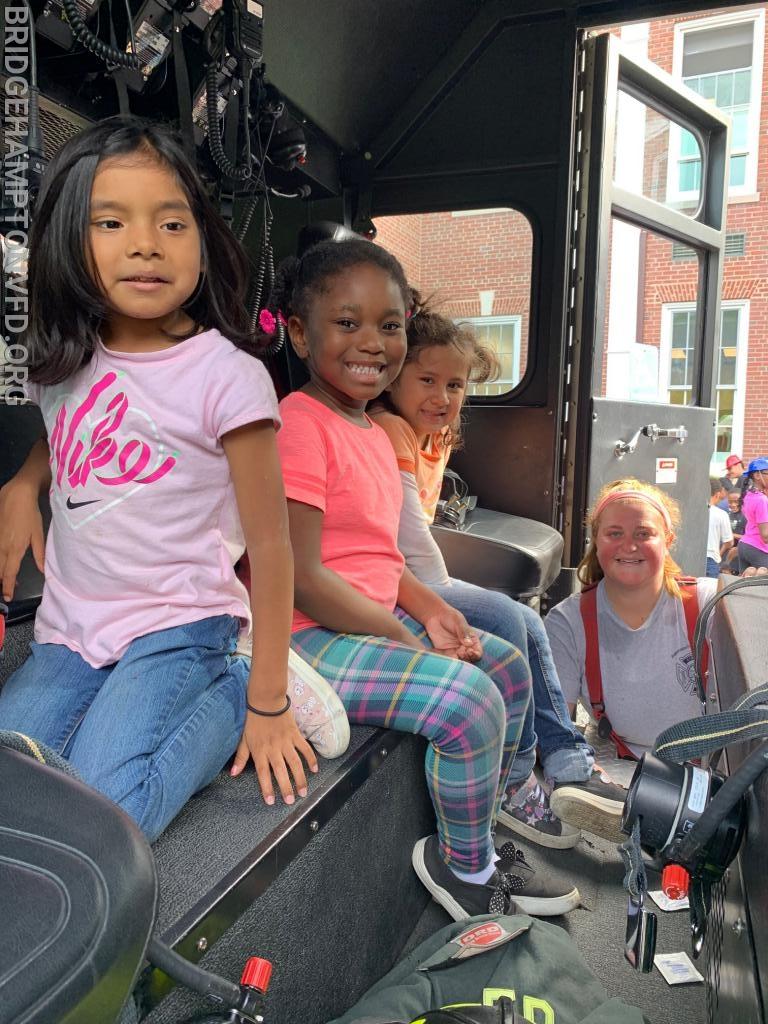 October 7, 2019 Bridgehampton School visits the Bridgehampton Fire Department! BHFD Interior Firefighter Megan Dombkowski shows future firefighters the inside of the truck. 